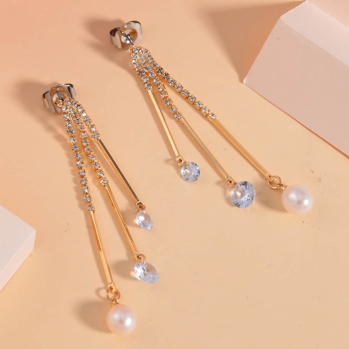 White Freshwater Pearl and Austrian Crystal Earrings in Goldtone image number 1