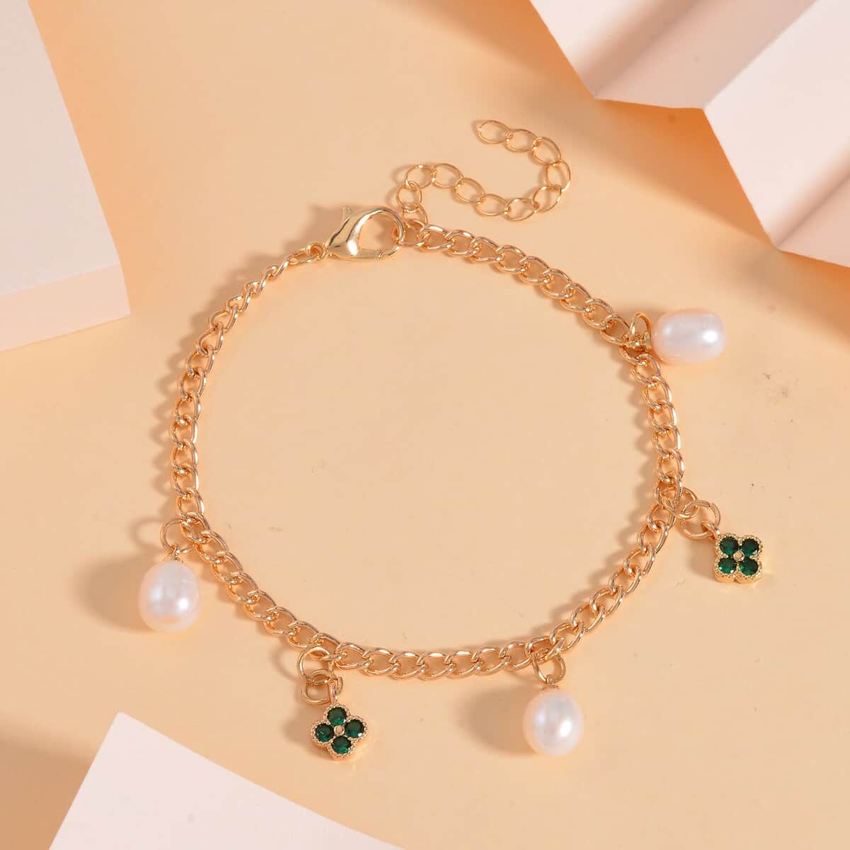 White Freshwater Pearl and Green Austrian Crystal Bracelet in Goldtone (7.50-8.50In) image number 1