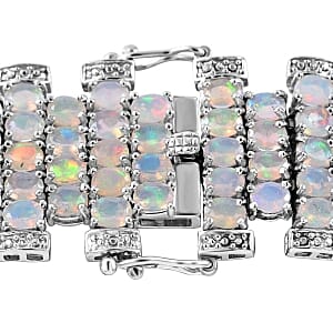 Premium Ethiopian Welo Opal 17.82 ctw Bracelet in Rhodium Over Sterling Silver (7 In) (40 g)