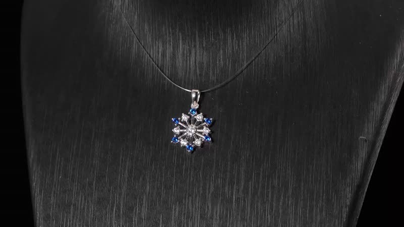 Simulated Diamond and Tanzanian Blue Spinel (DF) Snowflake Pendant in Rhodium Over Sterling Silver 0.60 ctw