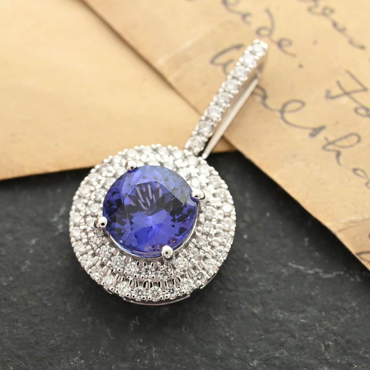 Rhapsody 950 Platinum AAAA Tanzanite and E-F VS Diamond Double Halo Pendant 1.75 ctw image number 1