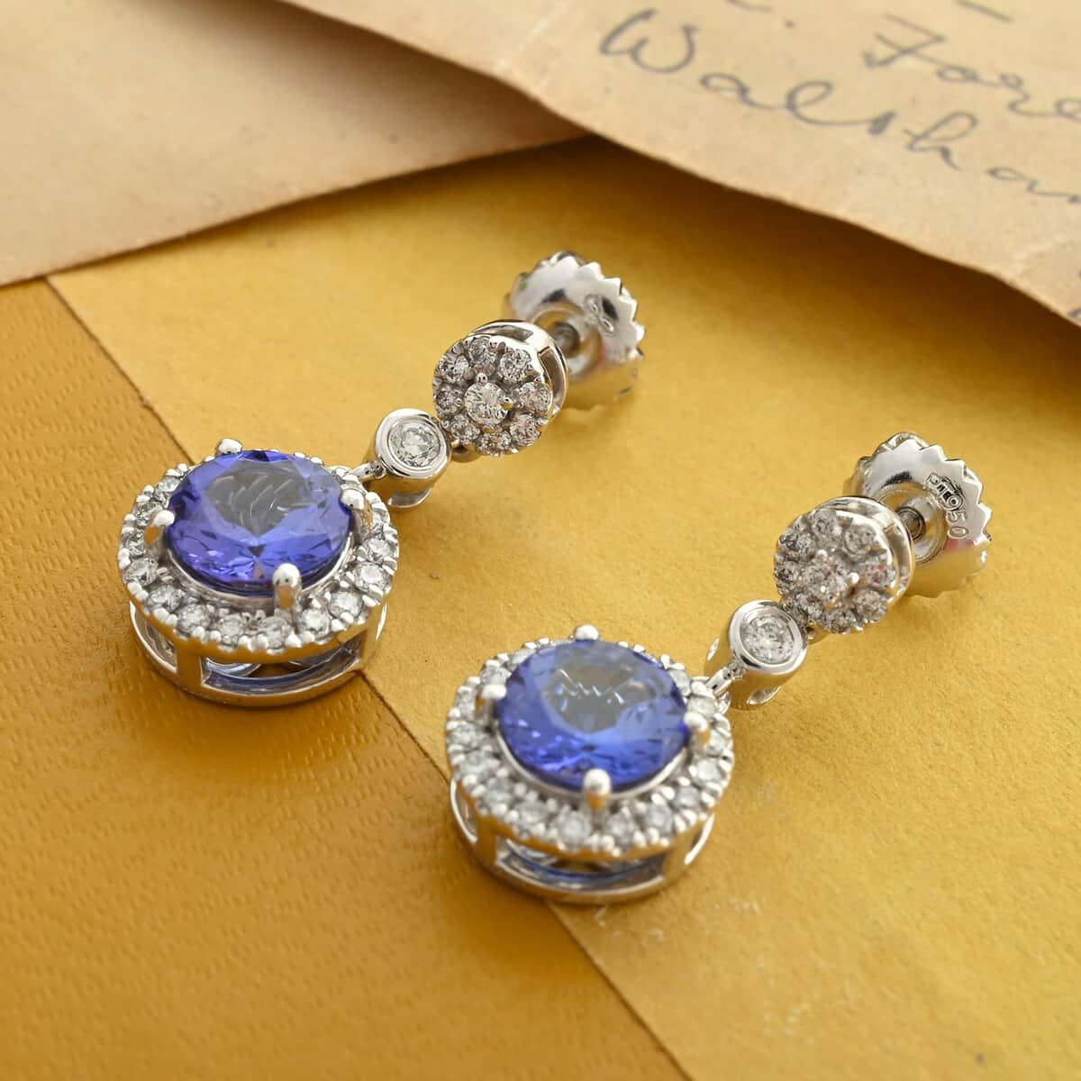 Certified & Appraised Rhapsody 950 Platinum AAAA Tanzanite and E-F VS Diamond Halo Earrings 2.25 ctw image number 1