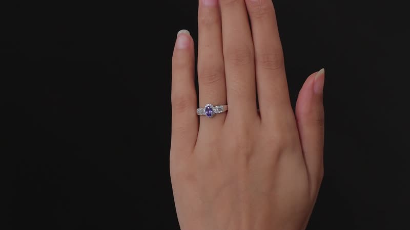 AAA Tanzanite, White Zircon Halo Ring in Platinum Over Sterling Silver (Size 10.0) 0.90 ctw