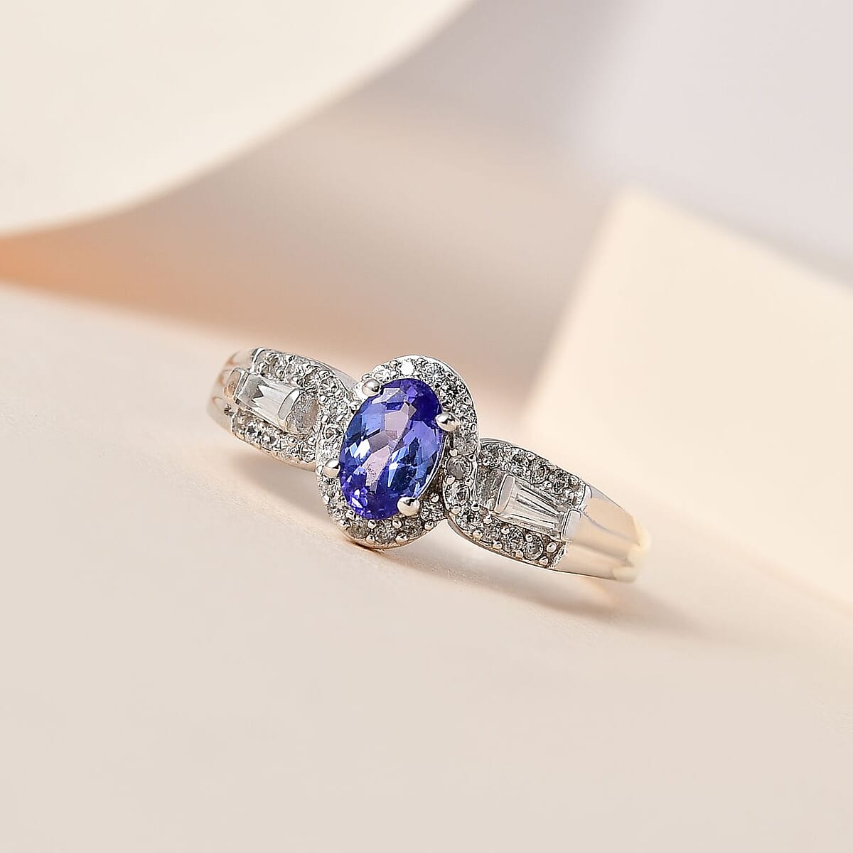 AAA Tanzanite, White Zircon Halo Ring in Platinum Over Sterling Silver (Size 10.0) 0.90 ctw image number 1
