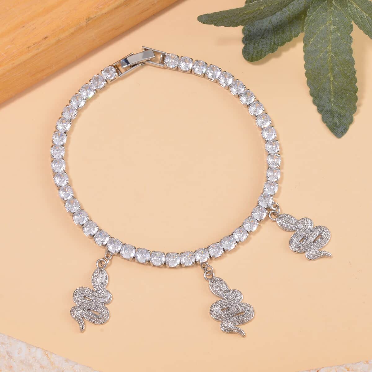 Simulated Diamond Snake Charm Bracelet in Silvertone (7.50 In) 5.00 ctw image number 1