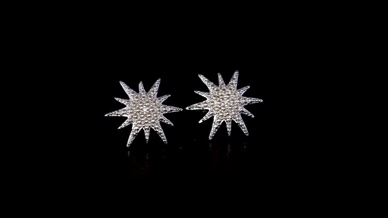 Diamond Accent Sunburst Stud Earrings in Platinum Over Sterling Silver