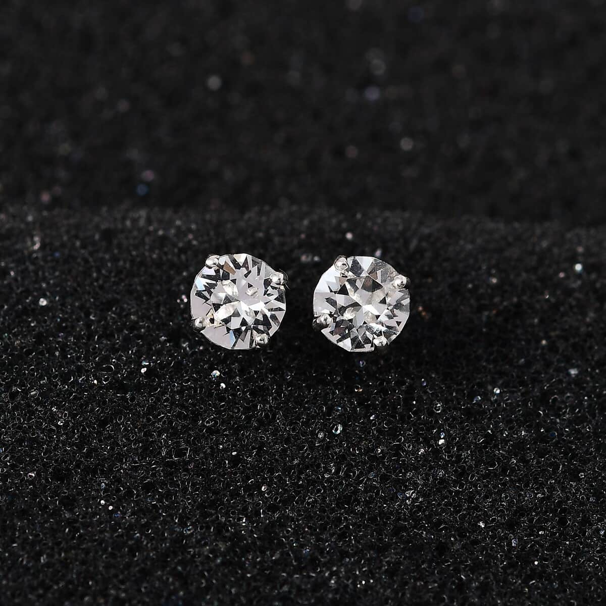 Buy White Crystal Solitaire Stud Earrings in Platinum Over Sterling ...