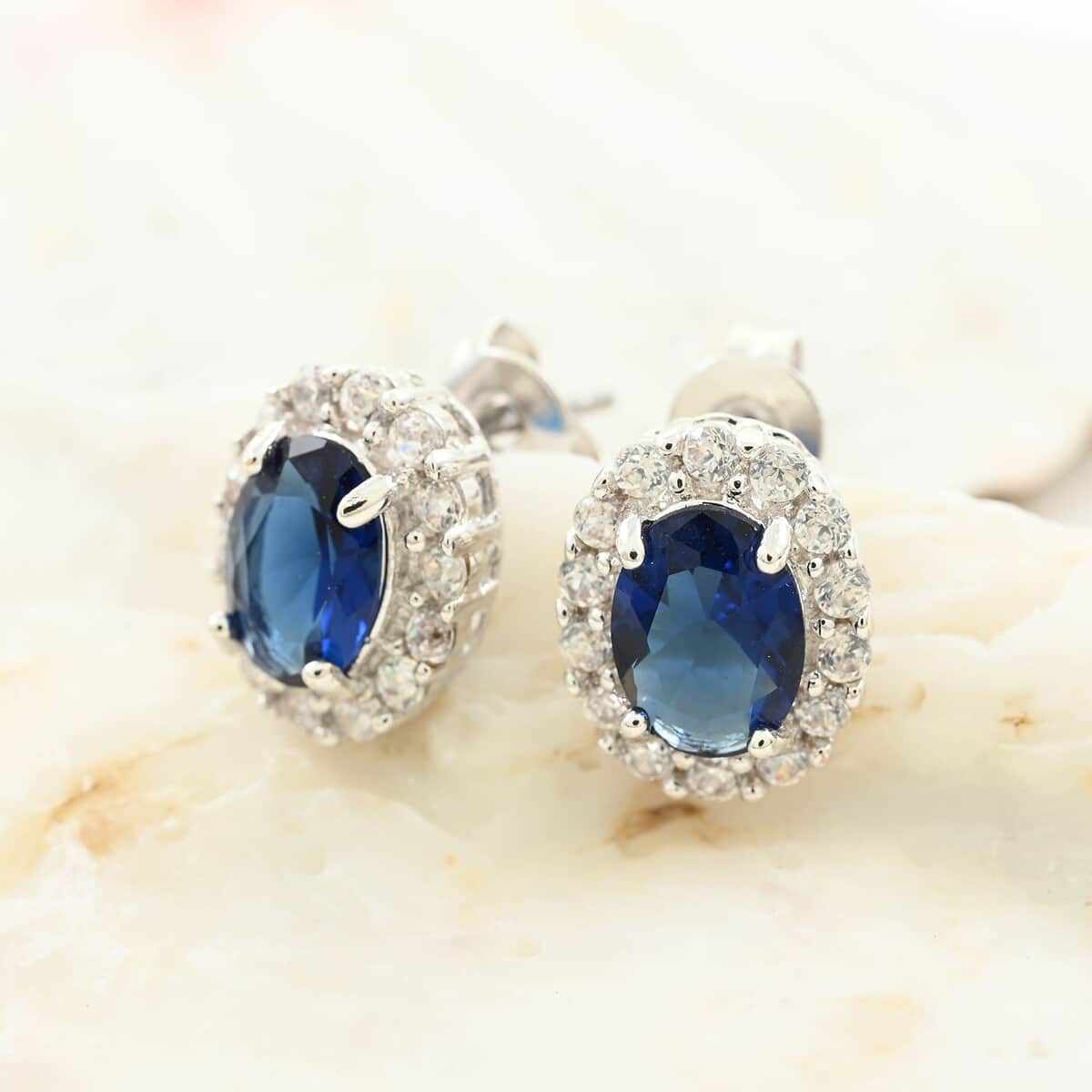 Simulated Blue and White Diamond Earrings in Silvertone 3.25 ctw image number 1