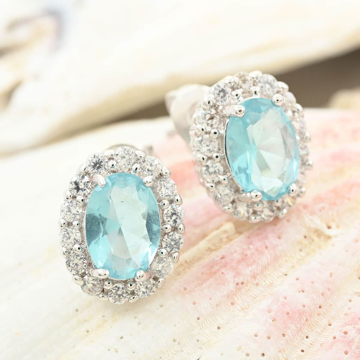 Simulated Sky Blue and White Diamond Earrings in Silvertone 3.25 ctw image number 1