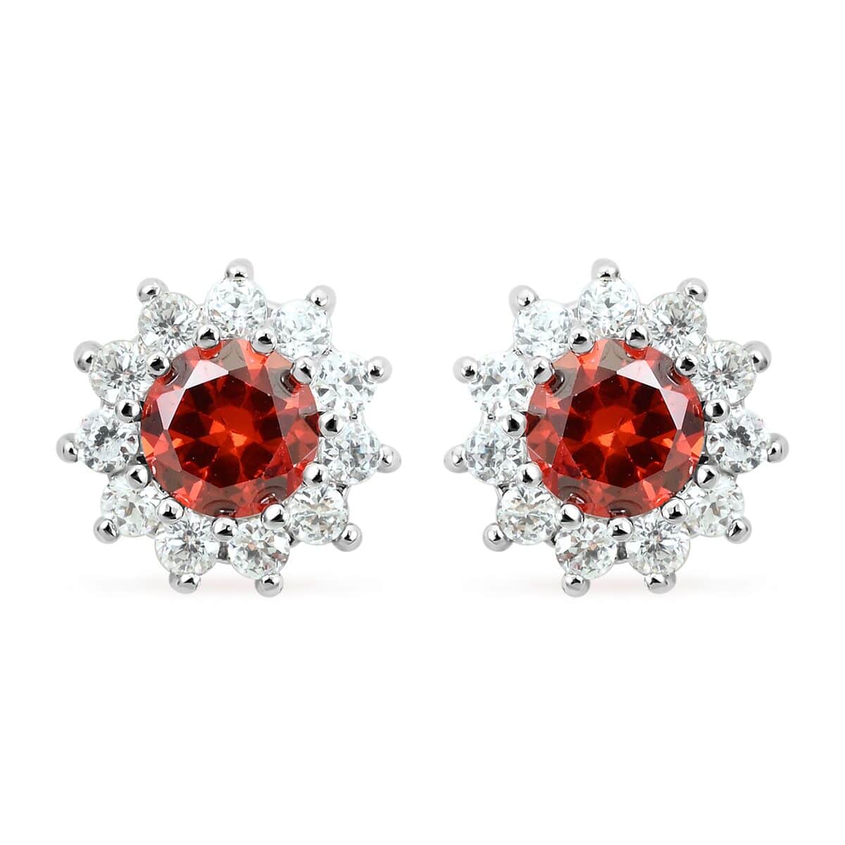 Simulated Red and White Diamond Halo Stud Earrings in Silvertone image number 0