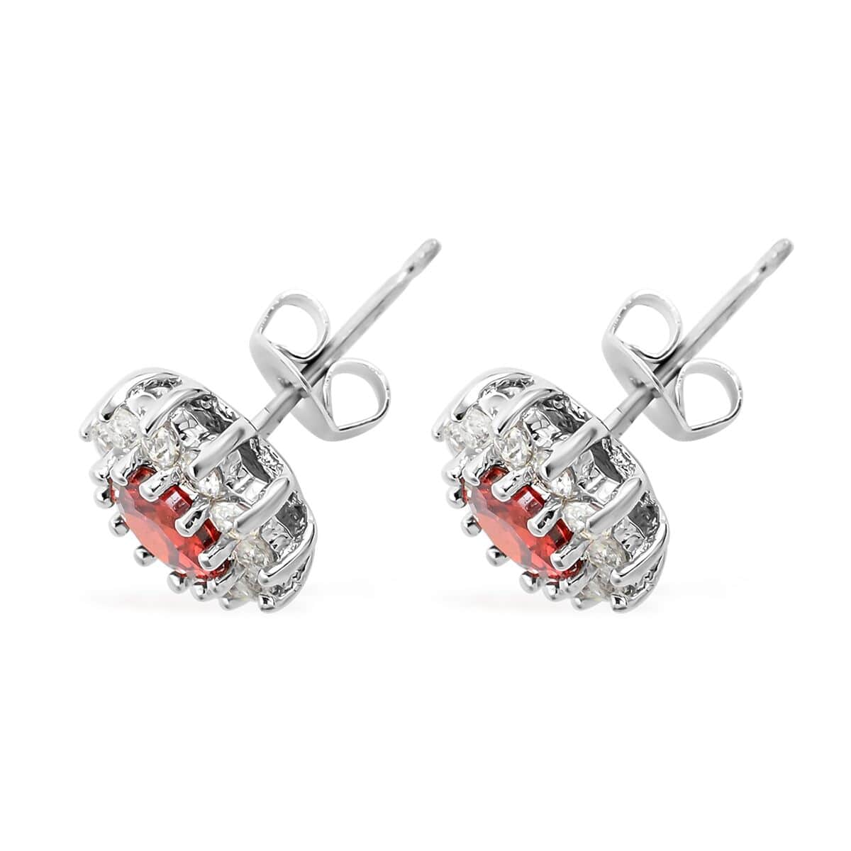 Simulated Red and White Diamond Halo Stud Earrings in Silvertone image number 3