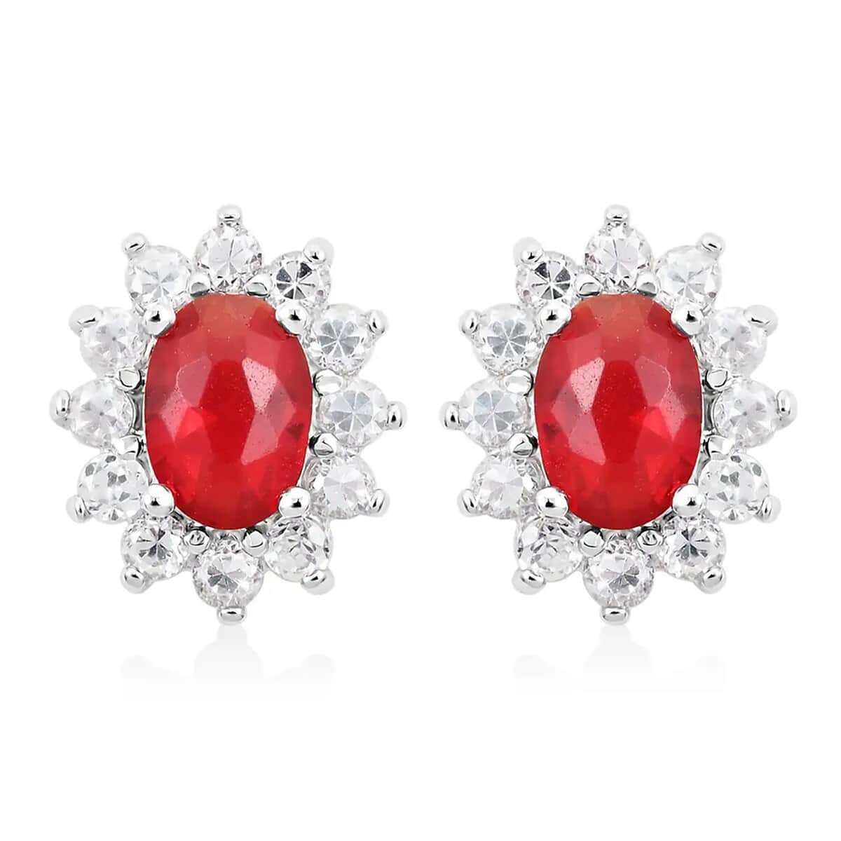Simulated Red and White Diamond Halo Stud Earrings in Silvertone image number 0