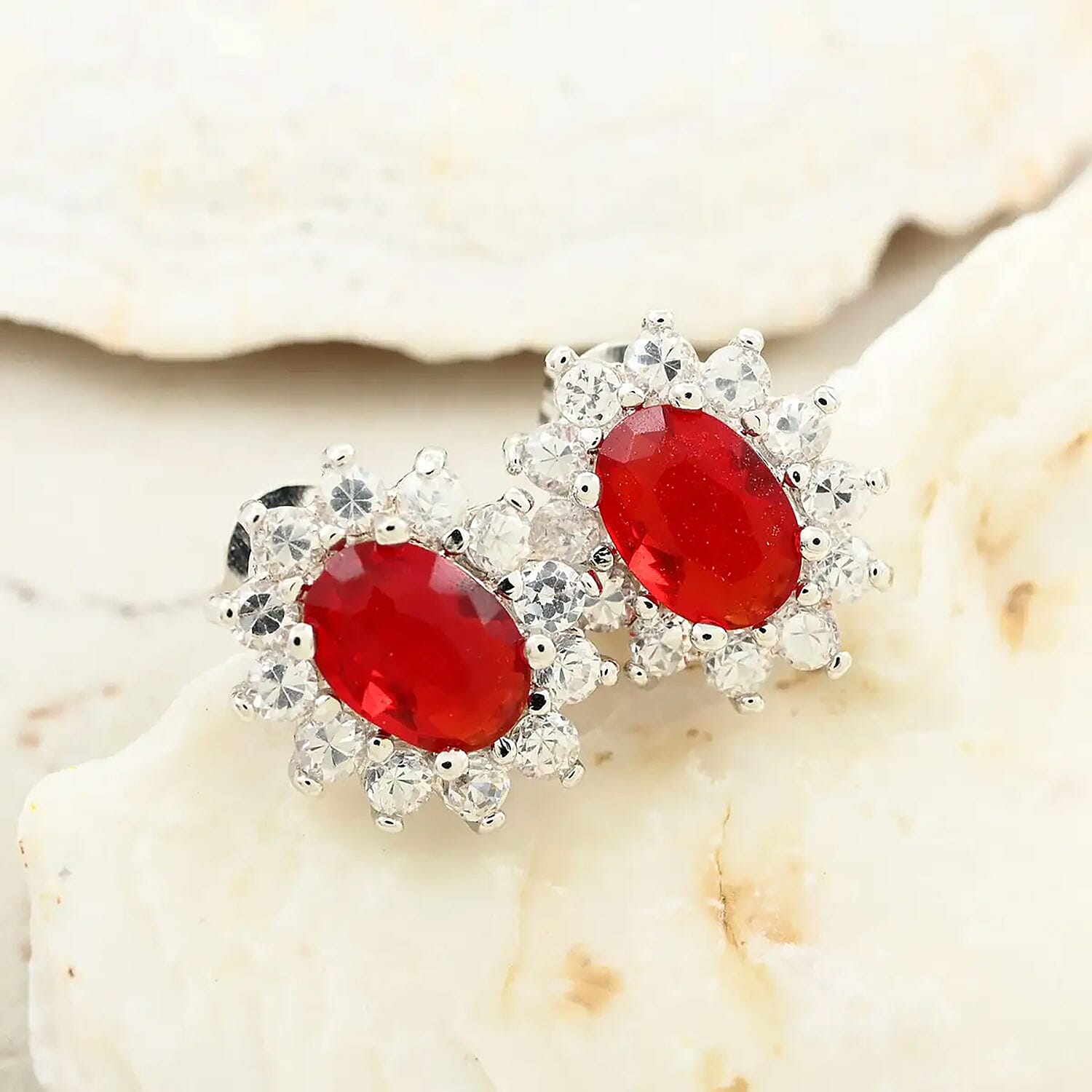 Simulated Red and White Diamond Halo Stud Earrings in Silvertone