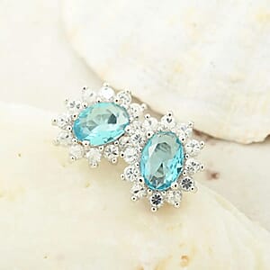 Simulated Blue and White Diamond Halo Stud Earrings in Silvertone