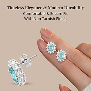 Simulated Blue and White Diamond Halo Stud Earrings in Silvertone