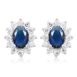 Simulated Blue and White Diamond Halo Stud Earrings in Silvertone