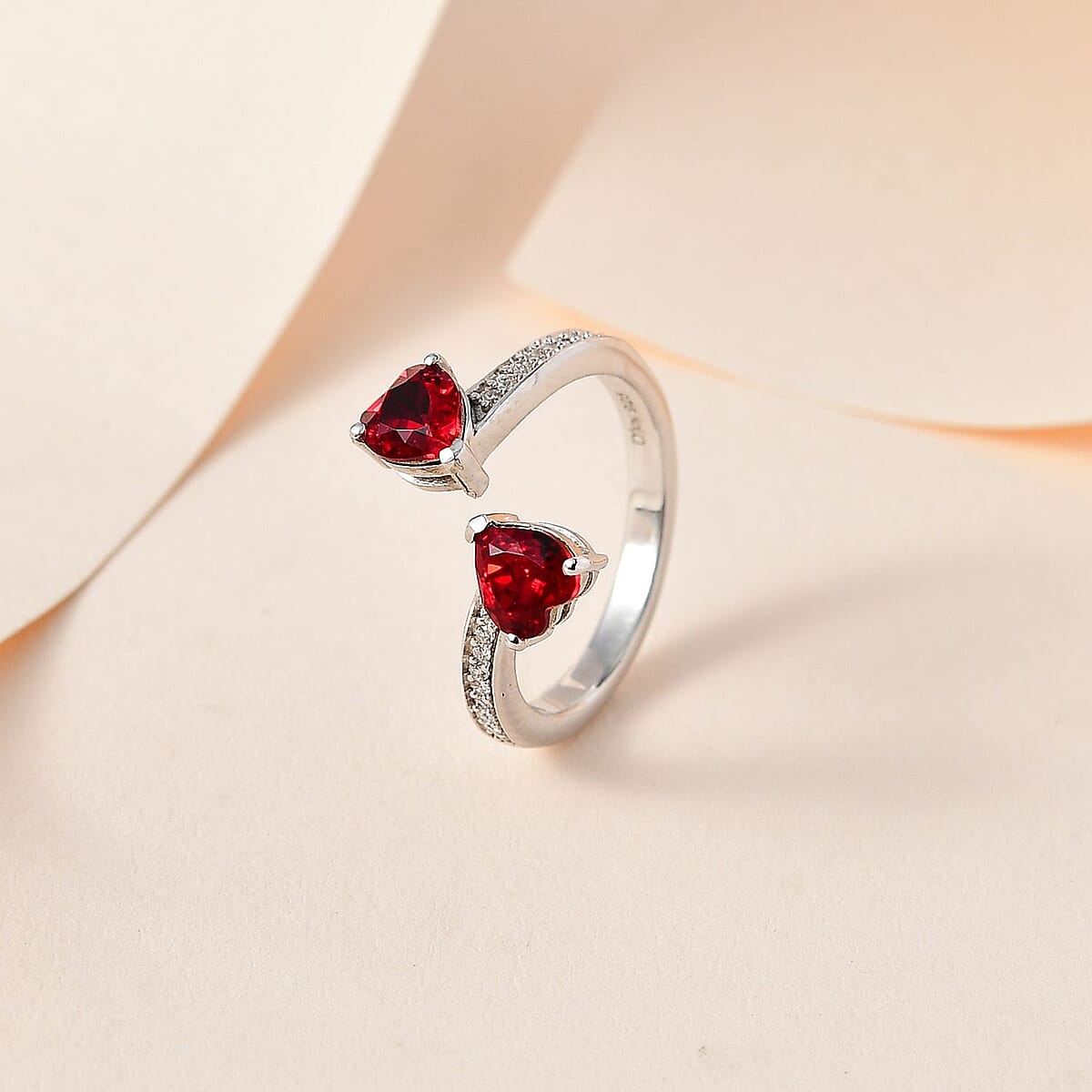 Designer Premium Siam Color Austrian Crystal and Simulated Diamond Heart Bypass Ring in Platinum Over Sterling Silver (Size 5.0) image number 1