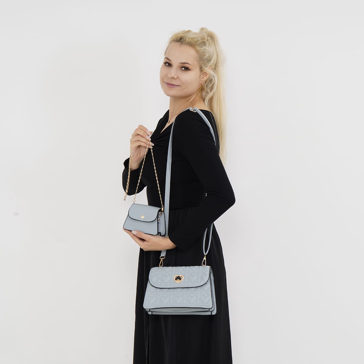 Set of 2 Blue Embossed Heart Pattern Faux Leather Crossbody Bag image number 1