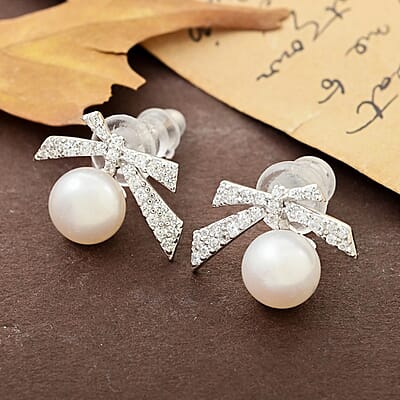 Freshwater Pearl and Simulated Diamond Bow Stud Earrings in Rhodium Over Sterling Silver 0.25 ctw