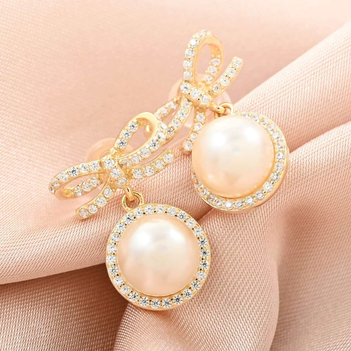 Freshwater Pearl and Simulated Diamond Bow Stud Earrings in 14K Yellow Gold Over Sterling Silver 0.40 ctw image number 1