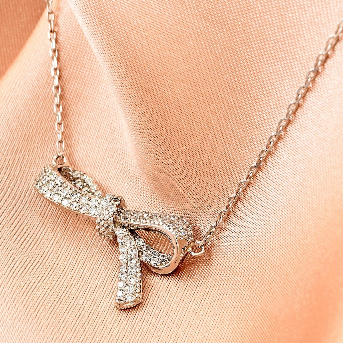 Simulated Diamond Bow Necklace 18 Inches in Rhodium Over Sterling Silver 0.85 ctw image number 1