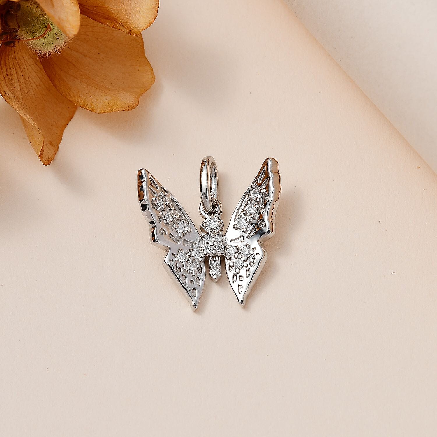 Moissanite Butterfly Charm in Platinum Over Sterling Silver 0.30 ctw