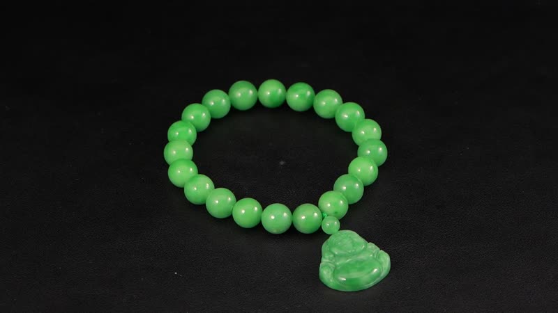 Green Jade Carved Buddha and Beaded Stretch Bracelet 178.00 ctw