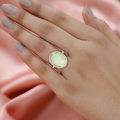 Certified & Appraised Iliana 18K White Gold AAA Ethiopian Welo Opal and G-H SI Diamond Halo Ring (Size 10.5) 5.35 Grams 6.50 ctw