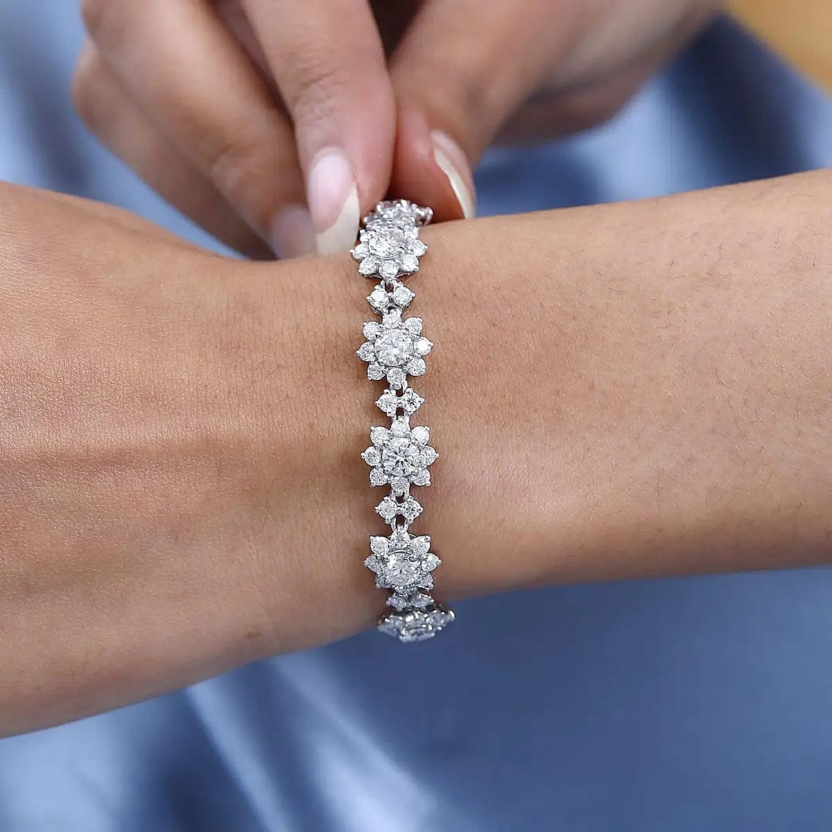 D'Joy White Moissanite 12.30 ctw Bracelet in Rhodium Over Sterling Silver (7.25 In)