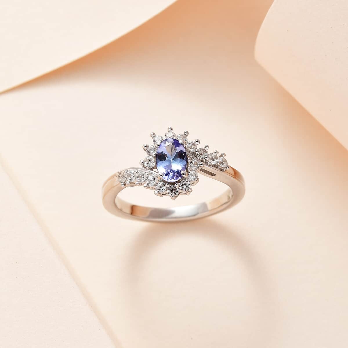 Peacock Tanzanite and White Zircon Bypass Ring in Platinum Over Sterling Silver (Size 10.0) 0.75 ctw image number 1