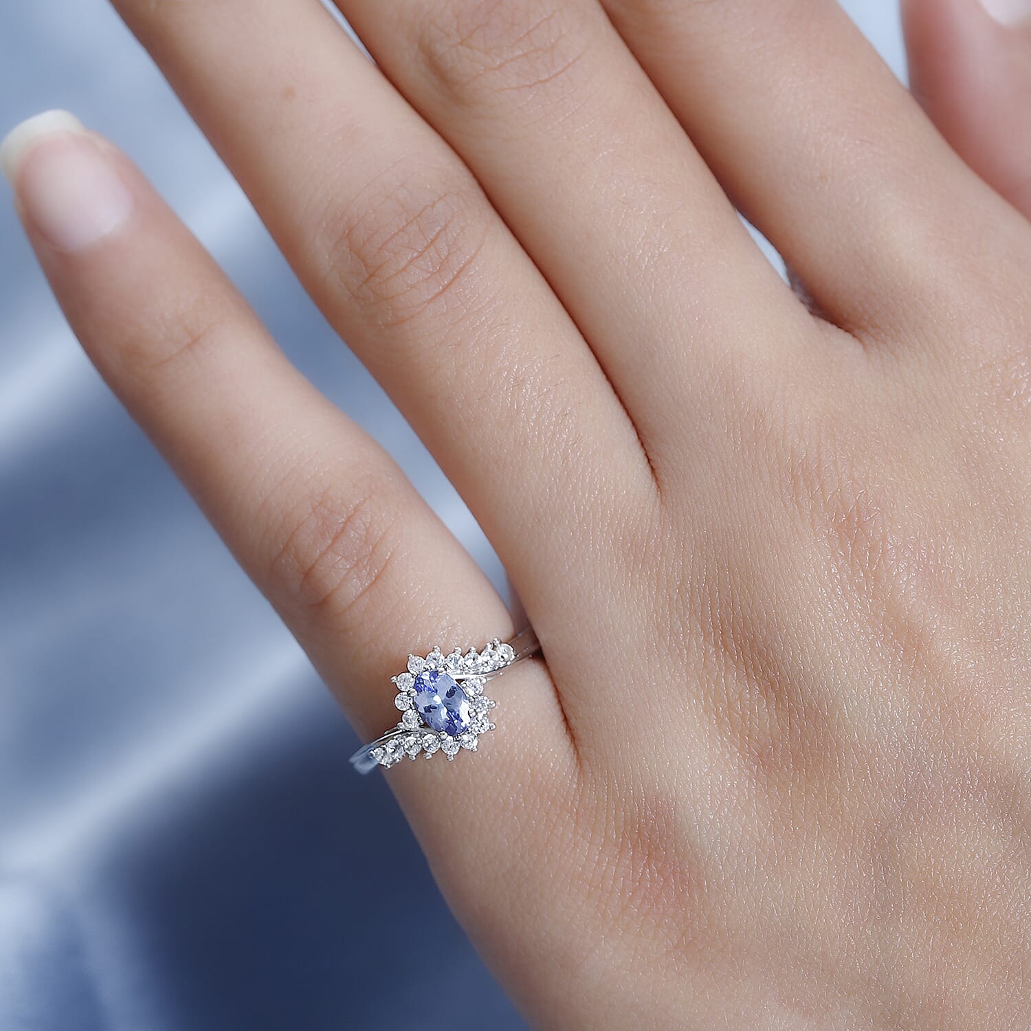 Peacock Tanzanite and White Zircon Bypass Ring in Platinum Over Sterling Silver (Size 10.0) 0.75 ctw