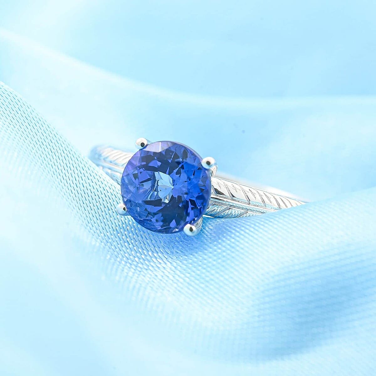 Certified & Appraised Rhapsody 950 Platinum AAAA Tanzanite Solitaire Ring (Size 5.0) 4.65 Grams 1.50 ctw image number 1