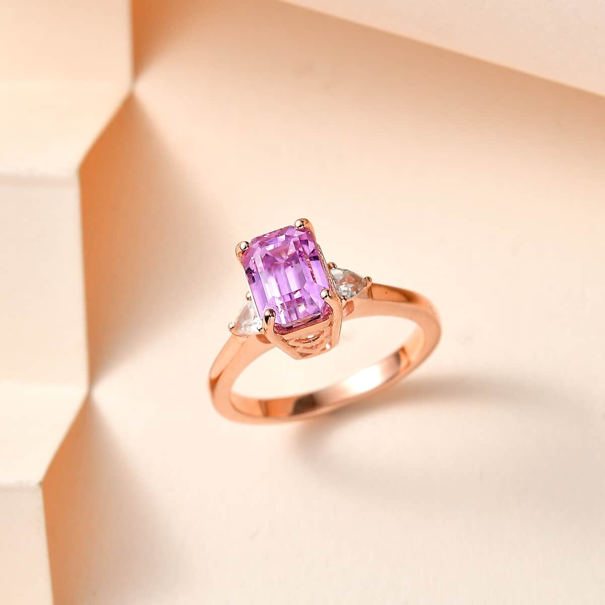 AAA Patroke Kunzite and White Zircon 3 Stone Ring in Vermeil Rose Gold Over Sterling Silver (Size 7.0) 3.25 ctw image number 1