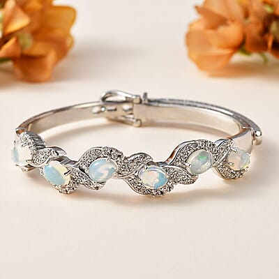 Ethiopian Welo Opal and White Zircon Bangle Bracelet in Platinum Over Sterling Silver (7.25 In) 6.00 ctw
