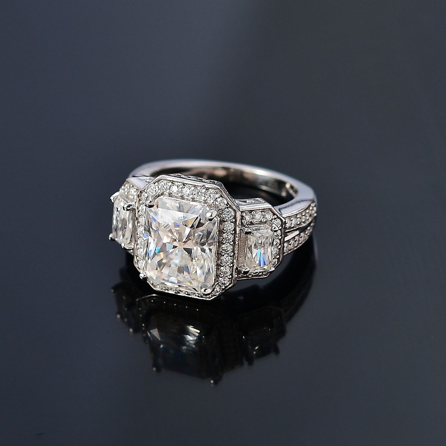 Moissanite Triple Halo Ring in Platinum Over Sterling Silver (Size 10.0) 5.10 ctw