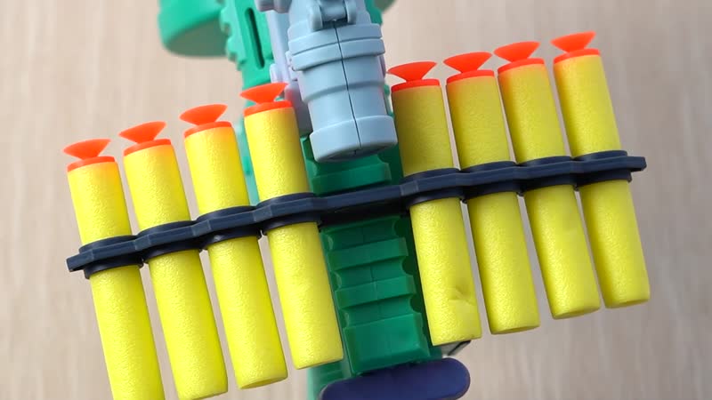 Multi Functional 3-in-1 Bubble Gun with Two Bottles of Bubble Liquid and 8 Soft Foam Bullets (16.53"x2.95"x9.44") (3 AA batteries Not Included)