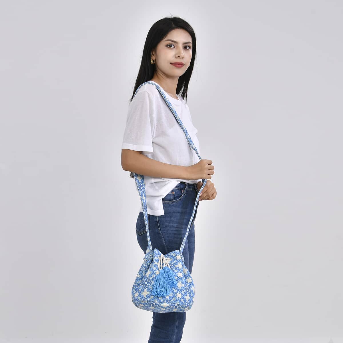 Blue Color Flower Pattern Crossbody Bag with Blue Tassel and Shoulder Strap image number 1