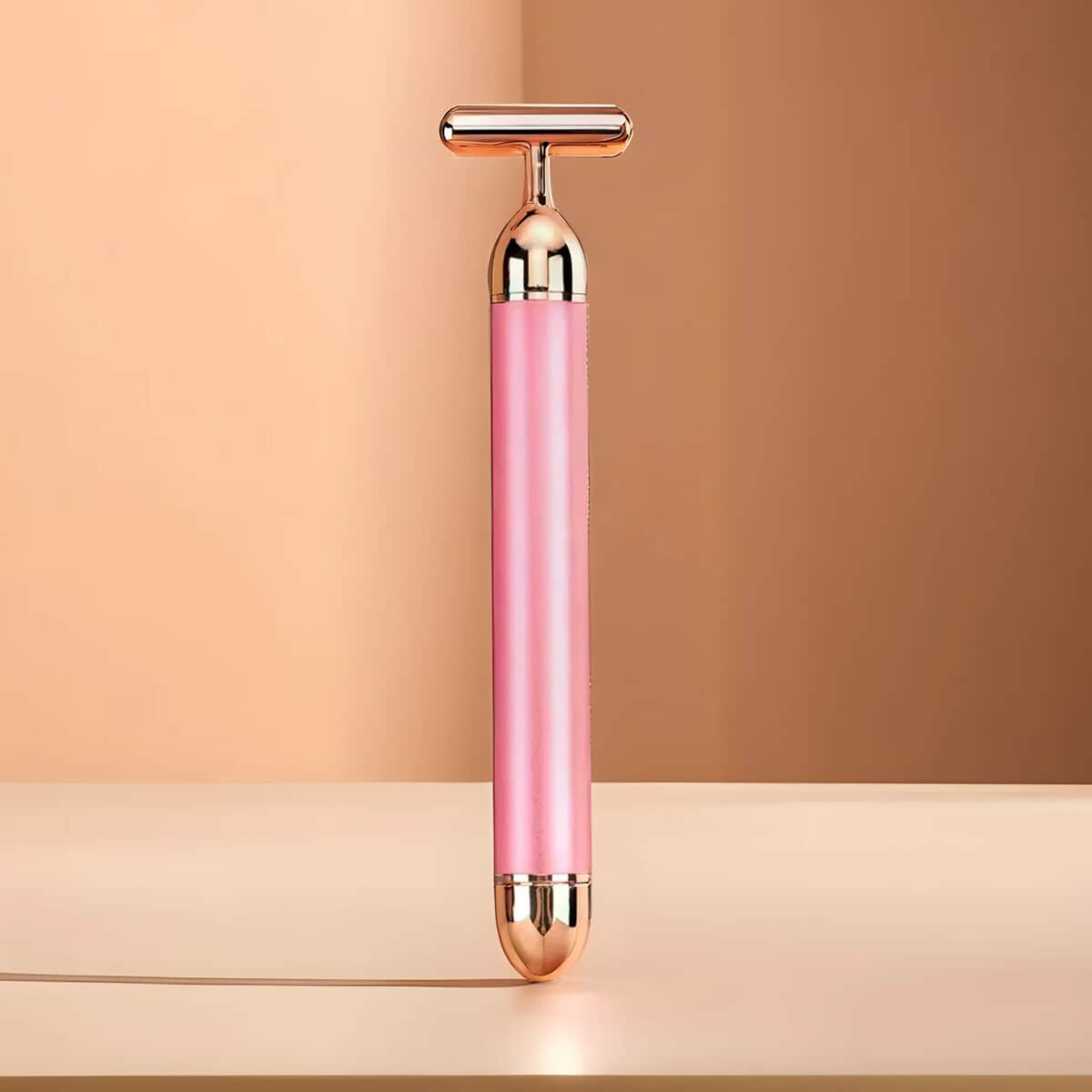 4-in-1 Face Massager Rollers with Four Interchangeable Massage Heads - Rose Gold, 1xAA Battery Not Including image number 1