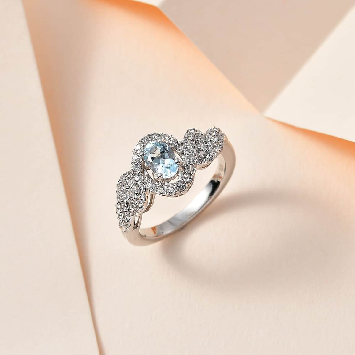 Premium Mangoro Aquamarine and White Zircon Halo Ring in Platinum Over Sterling Silver (Size 10.0) 0.90 ctw image number 1