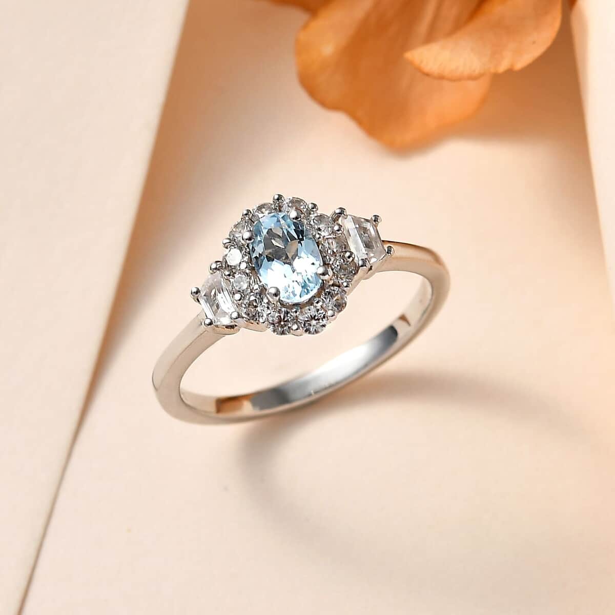 Premium Mangoro Aquamarine and White Zircon Halo Ring in Platinum Over Sterling Silver (Size 7.0) 1.10 ctw image number 1