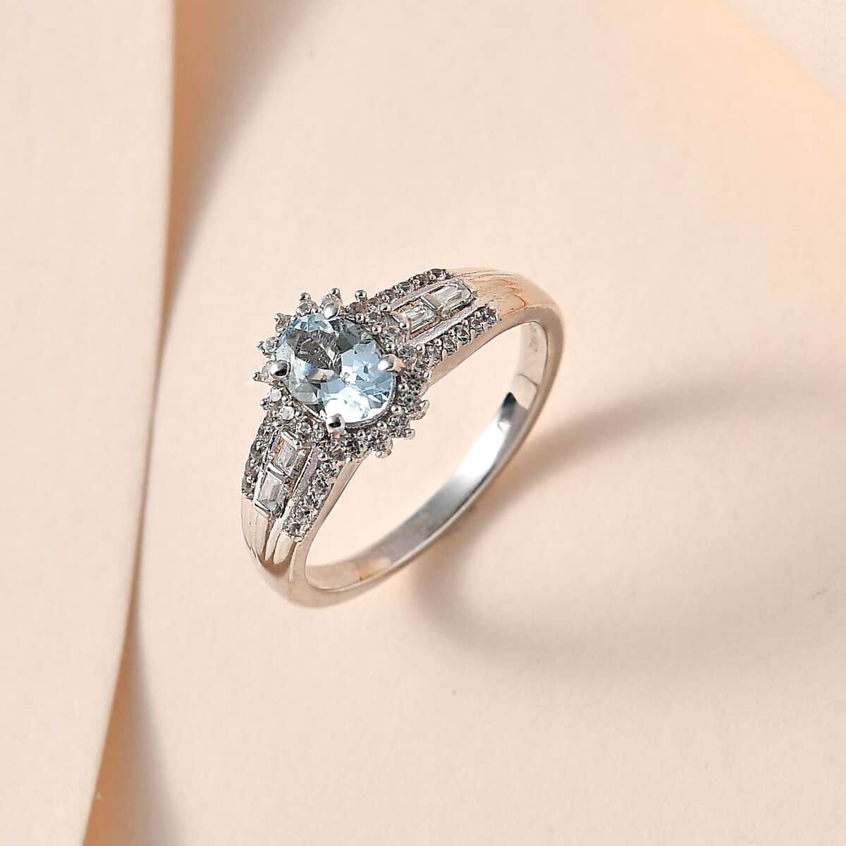 Premium Mangoro Aquamarine and White Zircon Halo Ring in Platinum Over Sterling Silver (Size 10.0) 1.15 ctw image number 1