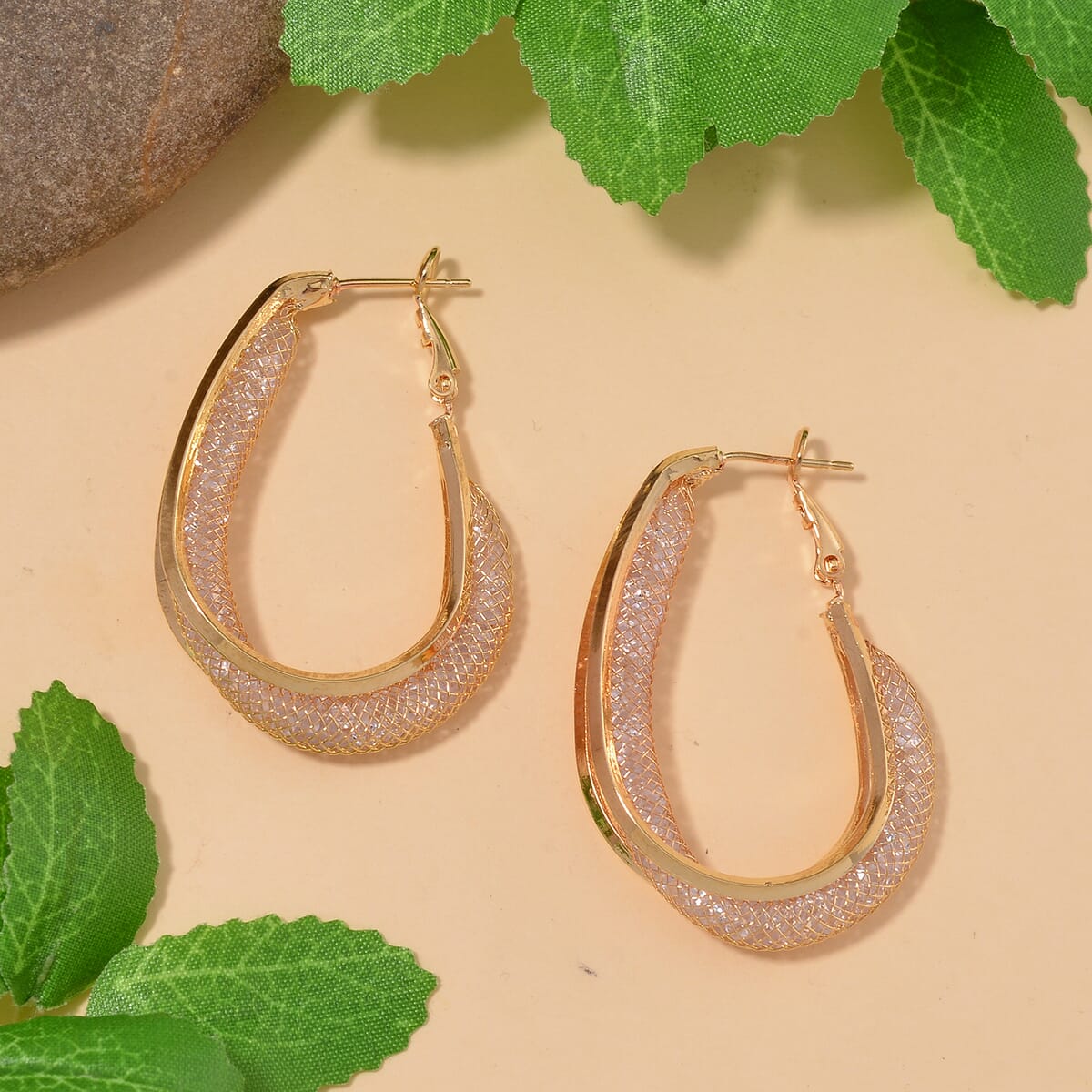 Sparkly White Austrian Crystal Infinity Inside Out Hoop Earrings in Goldtone image number 1
