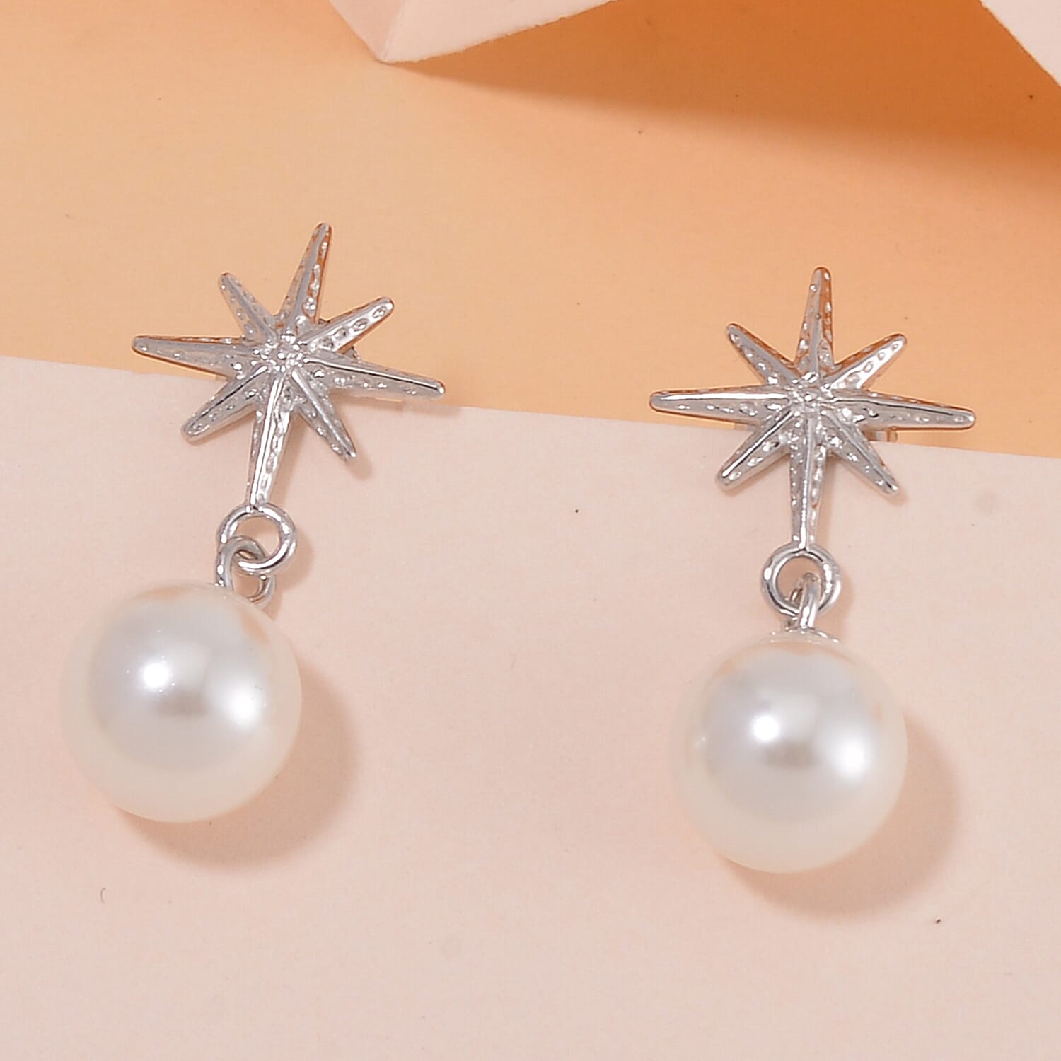 White Shell Pearl Star Earrings in Rhodium Over Sterling Silver