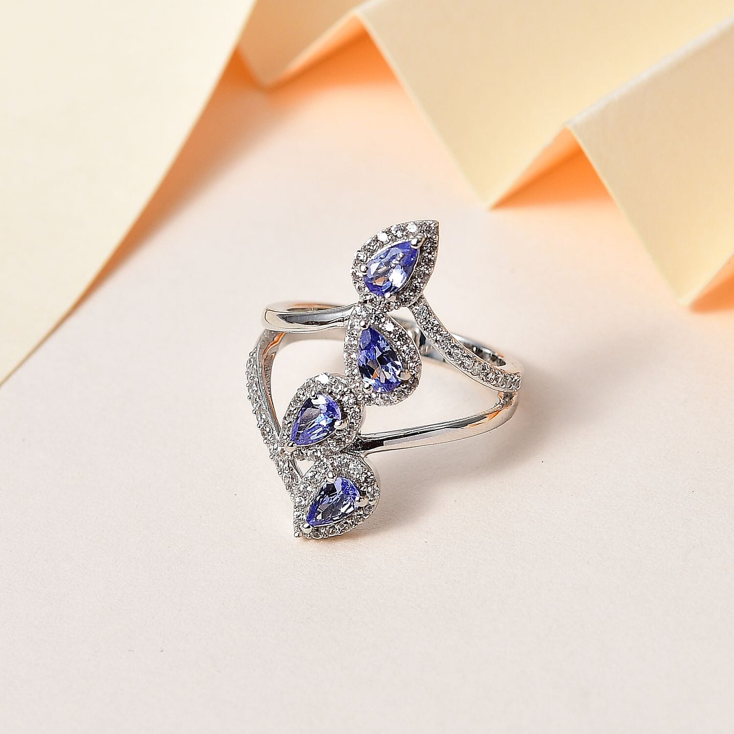 Tanzanite and White Zircon Ring in Platinum Over Sterling Silver (Size 6.0) 1.40 ctw