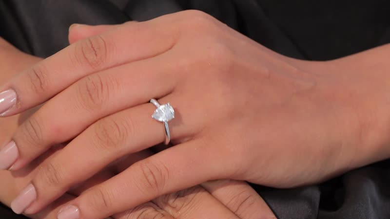 Moissanite (Pear 9x7mm) Ring in Platinum Over Sterling Silver (Size 6.0) 1.80 ctw