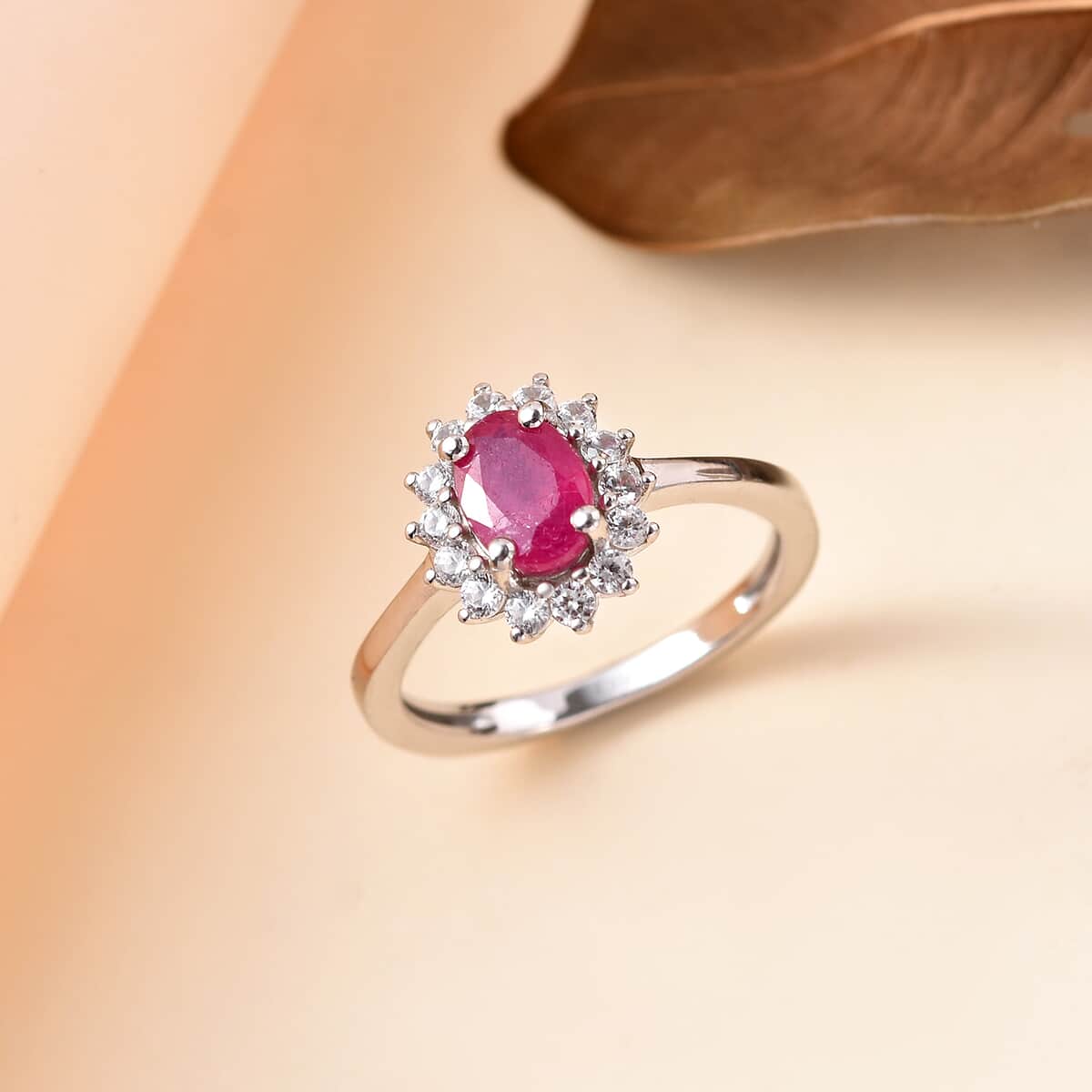 Niassa Ruby (FF) and White Zircon Sunburst Ring in Platinum Over Sterling Silver (Size 6.0) 1.70 ctw image number 1