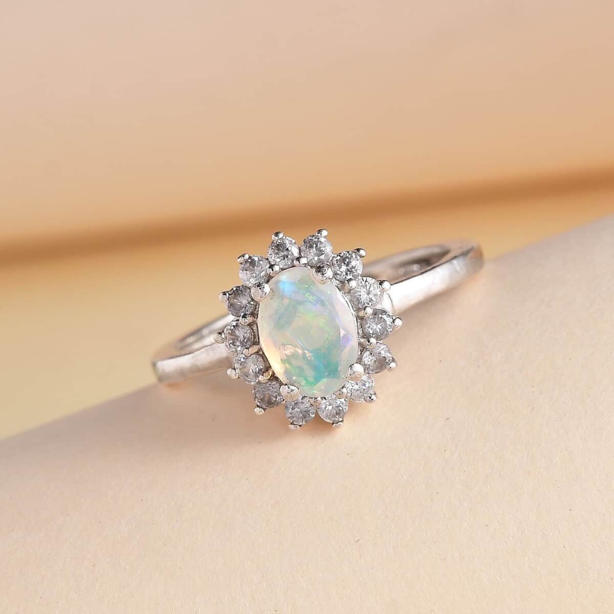 Ethiopian Welo Opal and White Zircon Sunburst Ring in Platinum Over Sterling Silver (Size 6.0) 1.10 ctw image number 1