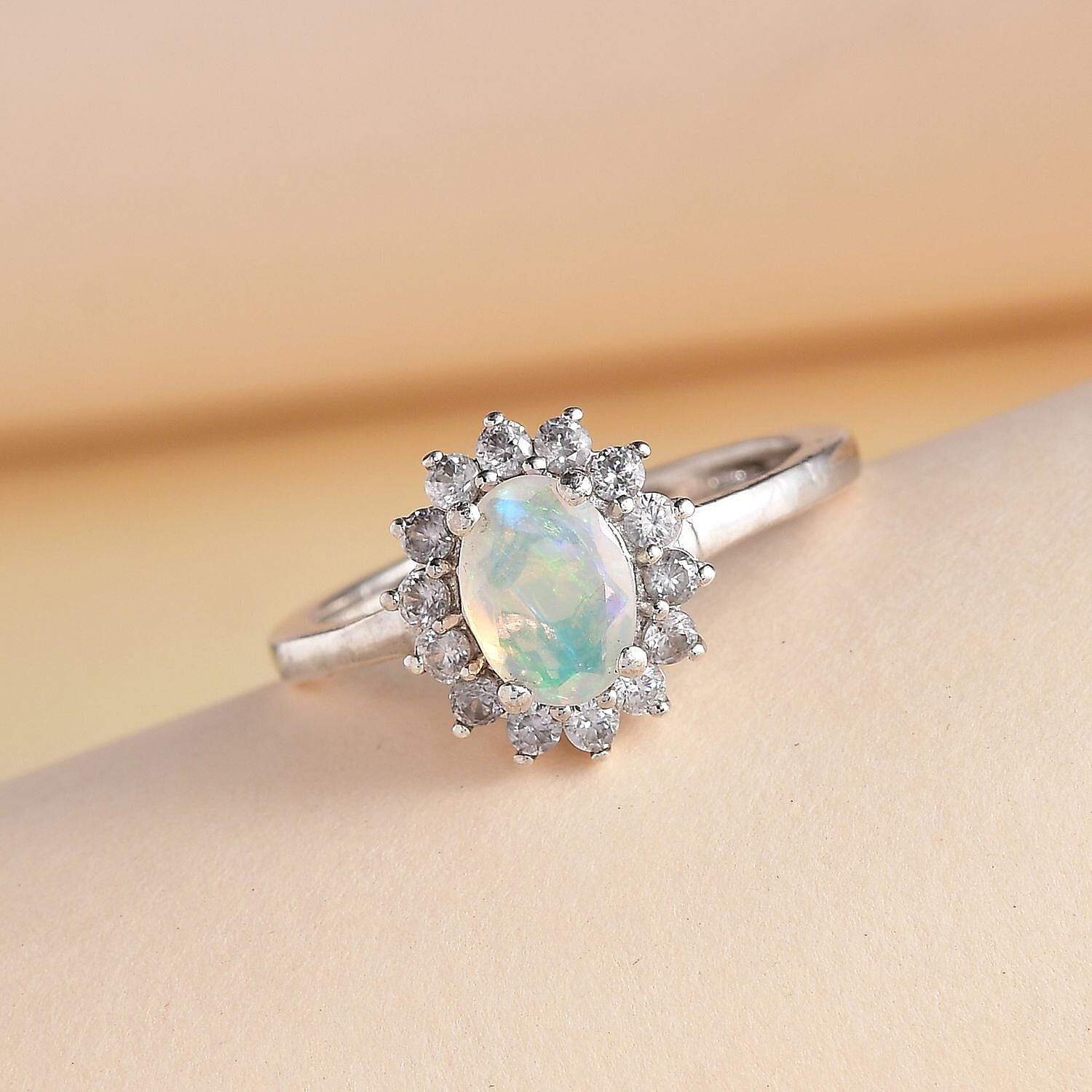 Ethiopian Welo Opal and White Zircon Sunburst Ring in Platinum Over Sterling Silver (Size 9.0) 1.10 ctw