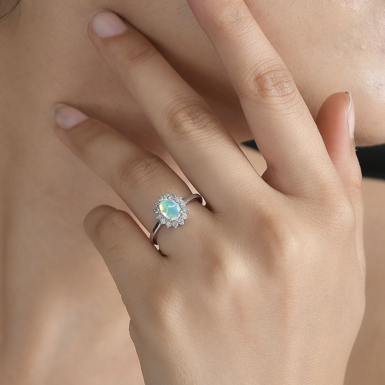 Ethiopian Welo Opal and White Zircon Sunburst Ring in Platinum Over Sterling Silver (Size 9.0) 1.10 ctw