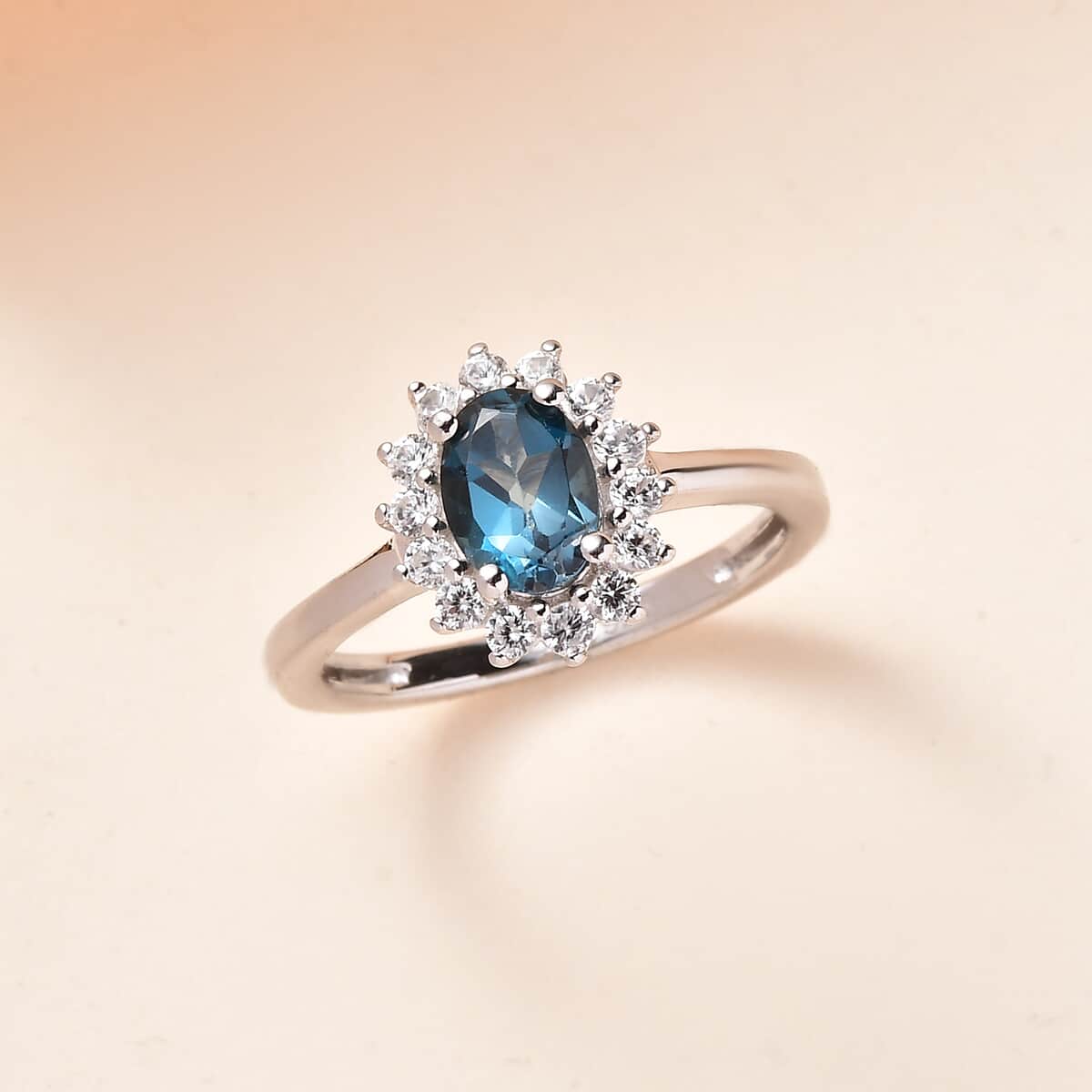 London Blue Topaz and White Zircon Sunburst Ring in Platinum Over Sterling Silver (Size 6.0) 1.40 ctw image number 1